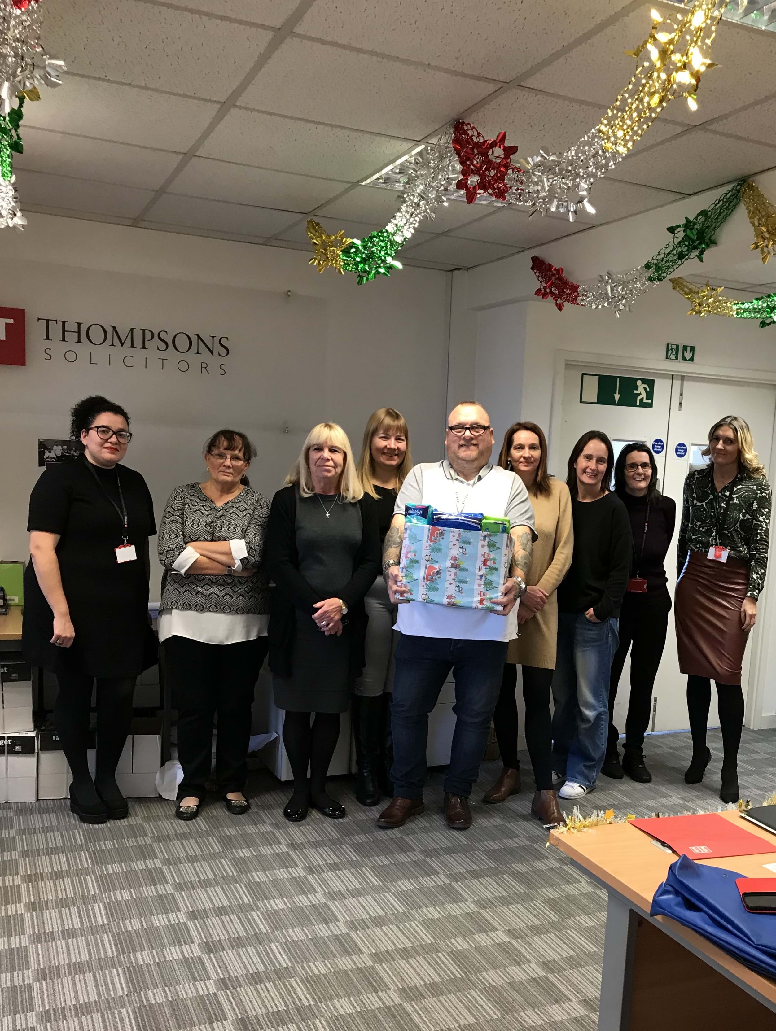 Members of the Thompsons Solicitors Dagenham team with their period poverty donation